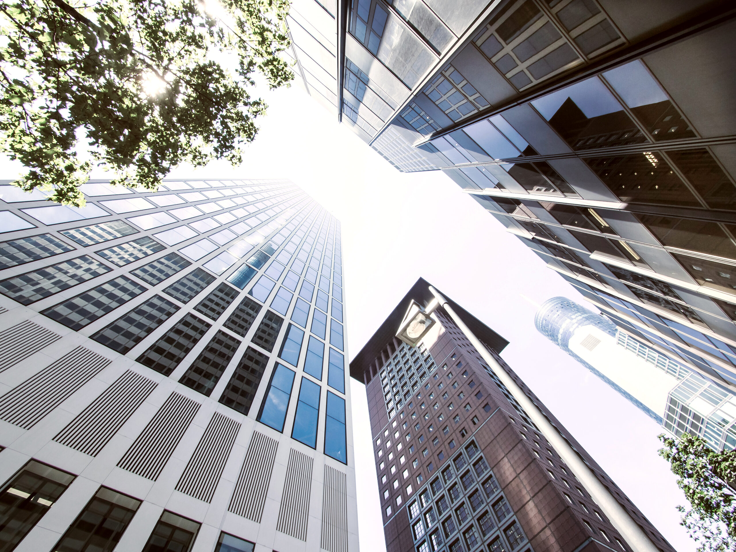 View to Taunusturm, Commerzbank Tower and State Bank of Hesse from below; Shutterstock ID 1874274397; Project_Name: Industries; Department : Global Industries; Name: Sara James; Date: 17/09/2021